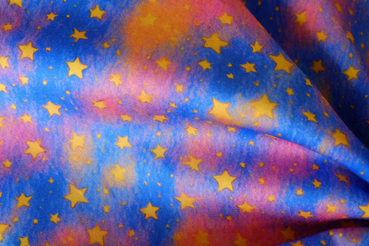 Cosmic Sunset Stars High-Density Cotton Sateen – 2.19 yd