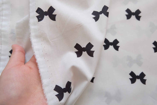 Bow Print Cotton Poplin Fabric – White with Black Mini Bows – Lightweight – 57” Wide – Approx. 4.4 Yards Available - BUBBO