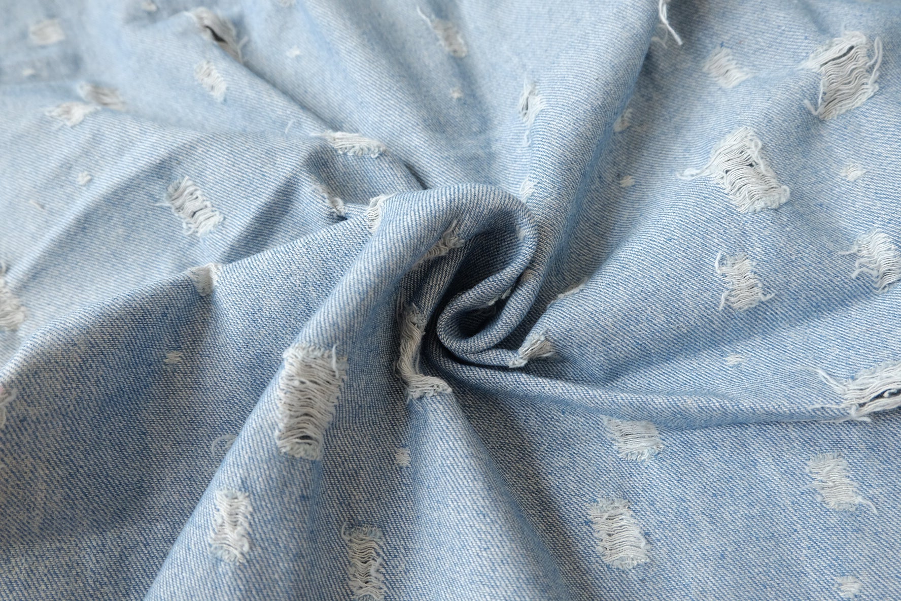 Washed Distressed Cotton Denim, sold by the yard