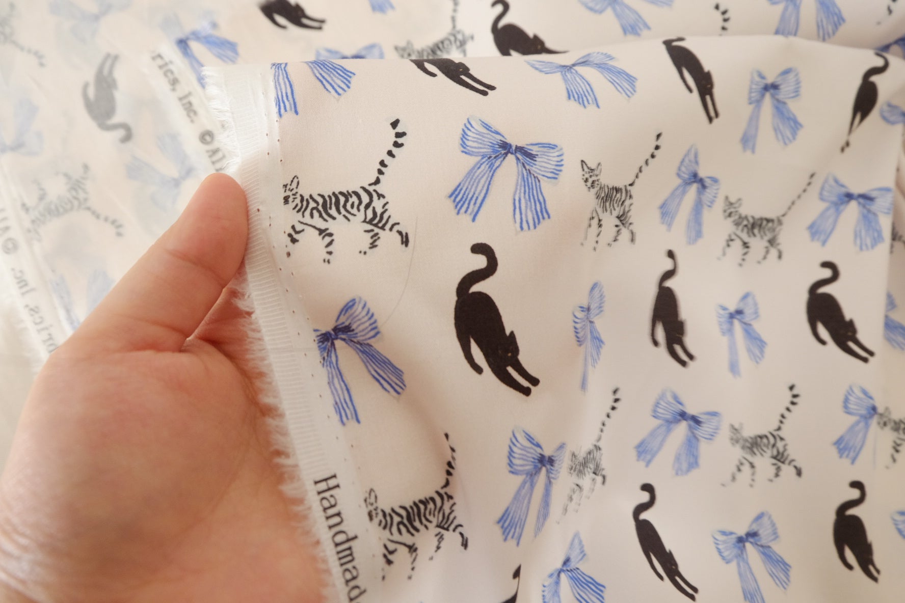 Ivory Cotton Sateen Fabric with Cat & Bow Print – Soft Structured Designer Cotton – 1.6 yd