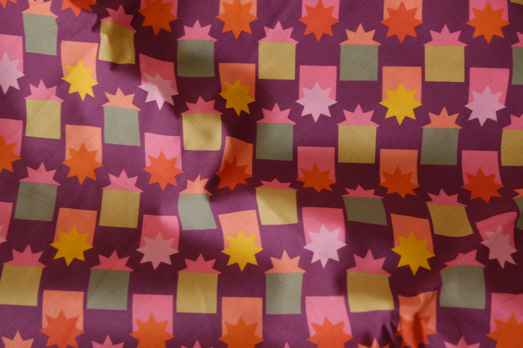 Plum Geometric Star Cotton Lawn – 2.7 yd