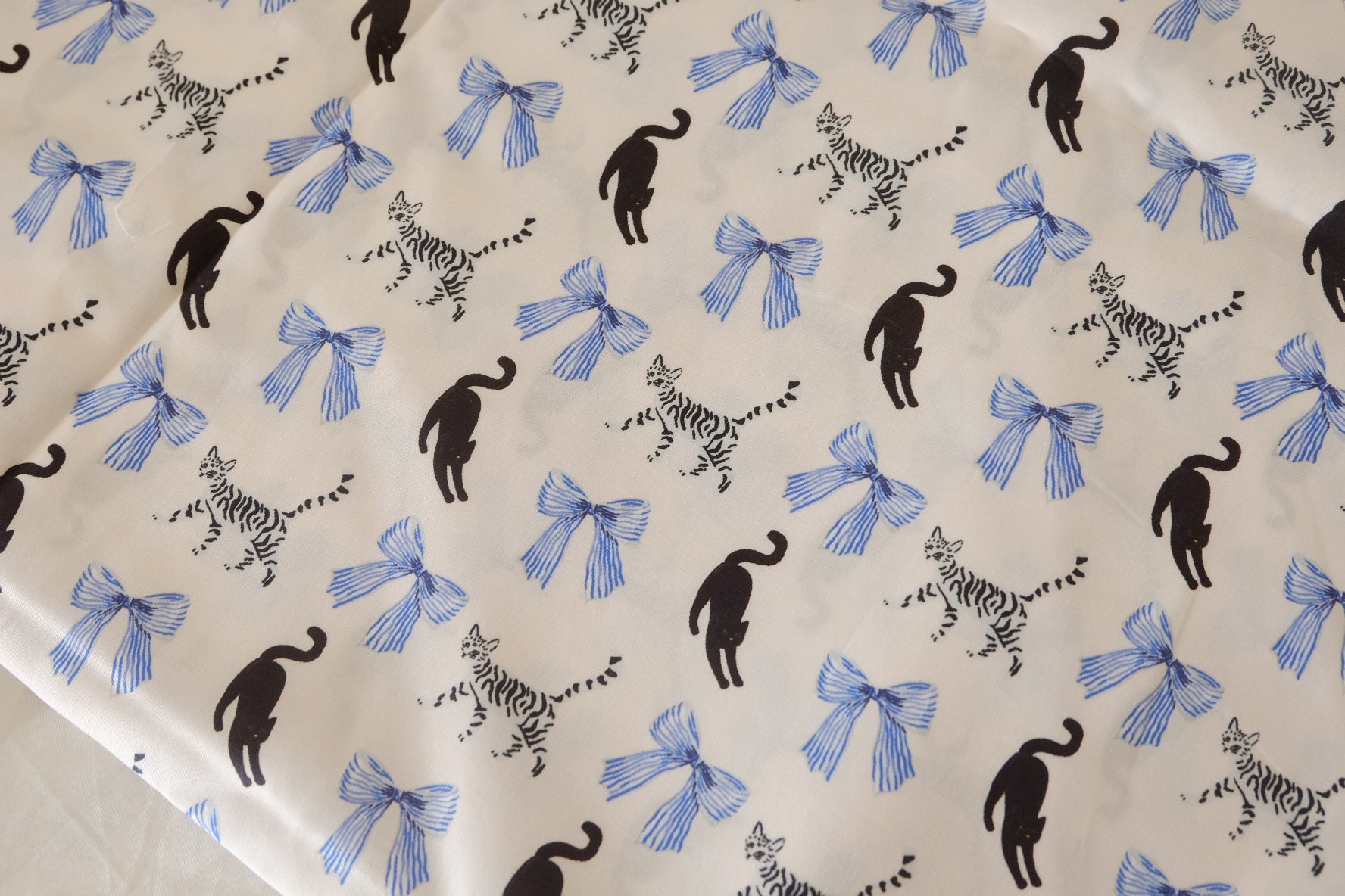 Ivory Cotton Sateen Fabric with Cat & Bow Print – Soft Structured Designer Cotton – 1.6 yd