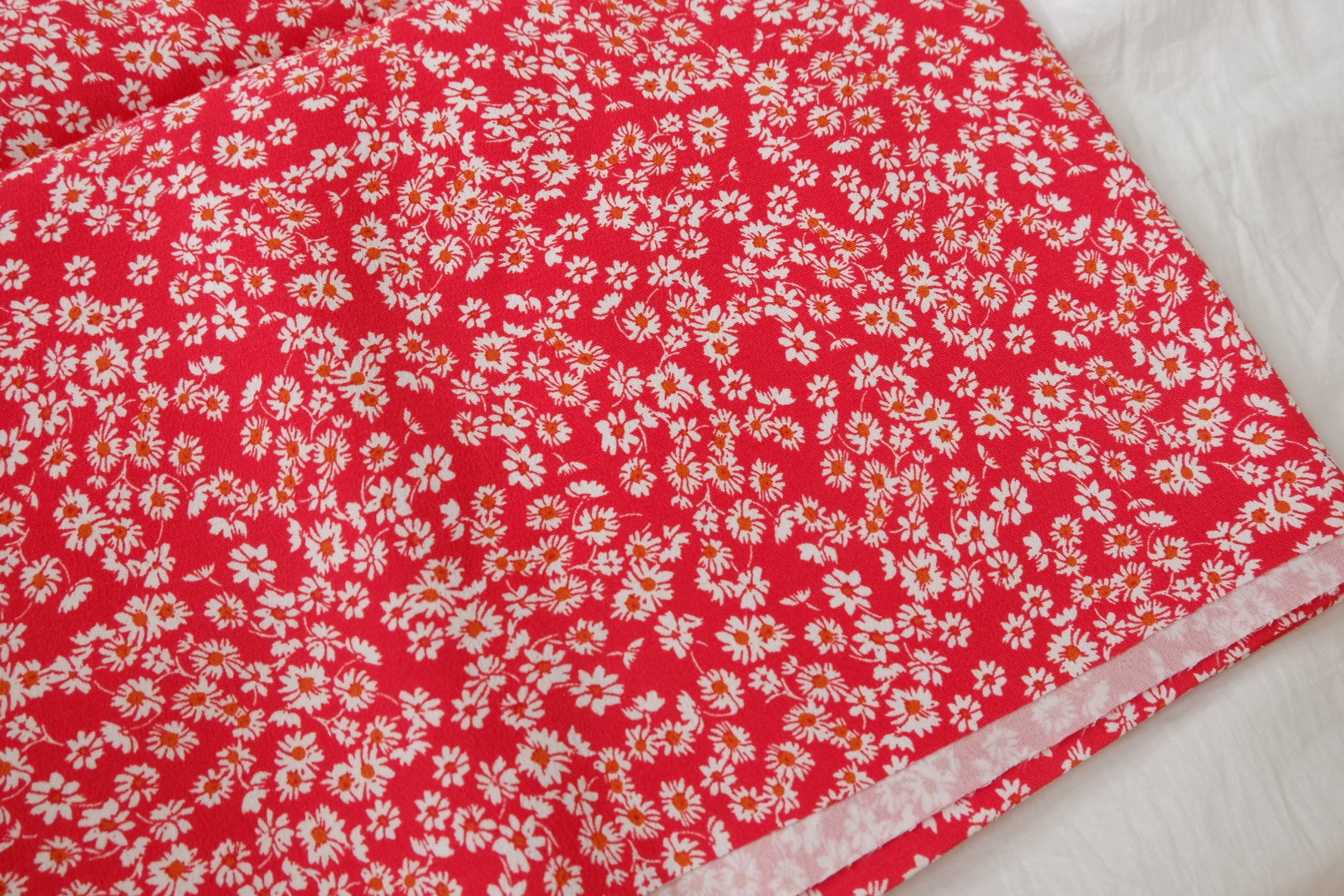 Red Ditsy Floral Cupro with Removable Backing, 2.19 Yards