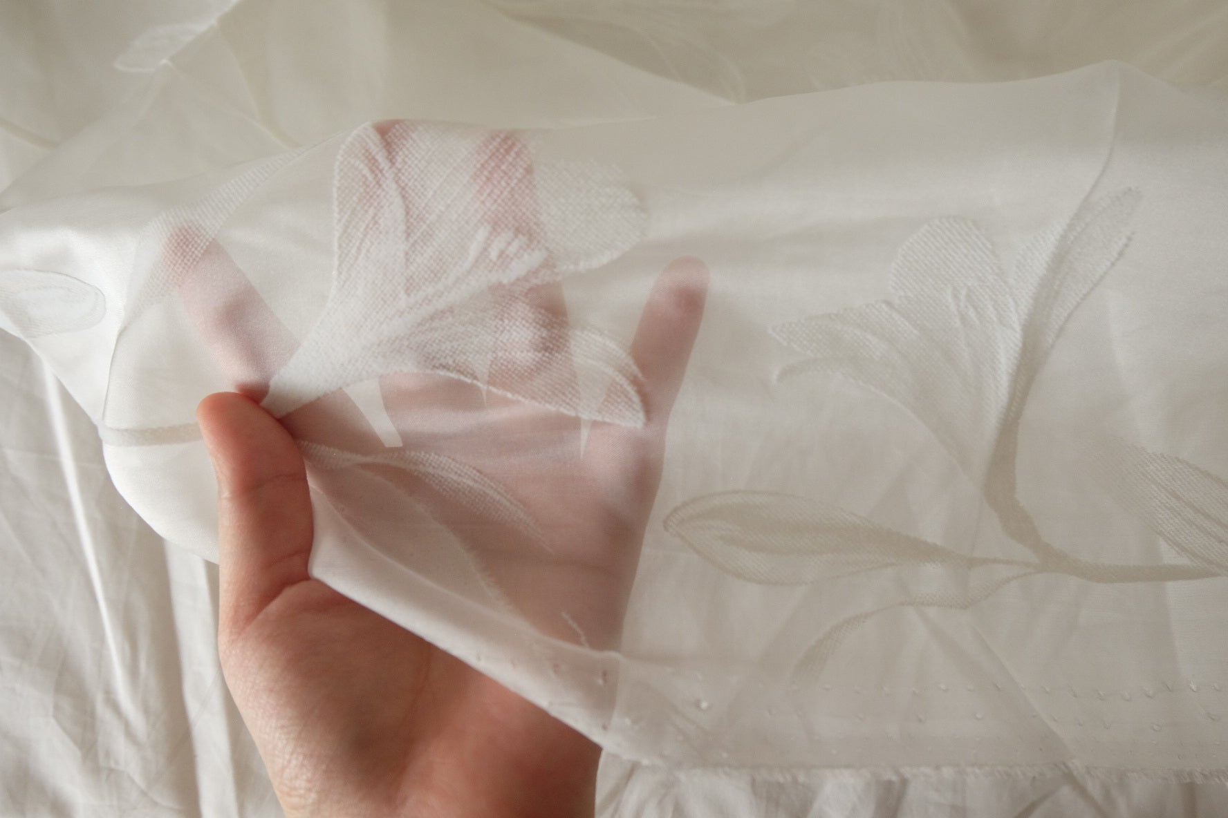 White Floral Flocked Polyester Mesh – 2.19 yd