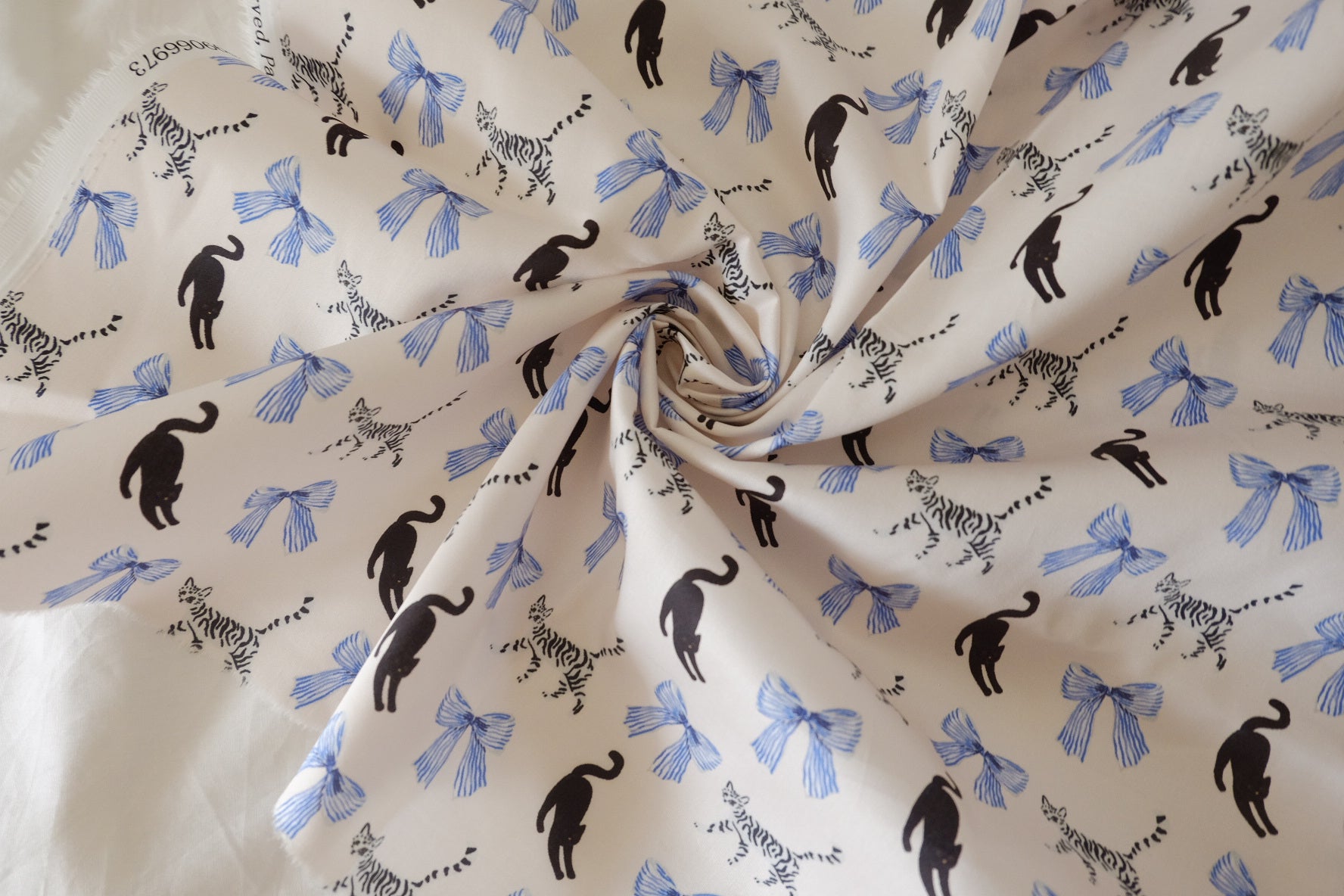 Ivory Cotton Sateen Fabric with Cat & Bow Print – Soft Structured Designer Cotton – 1.6 yd