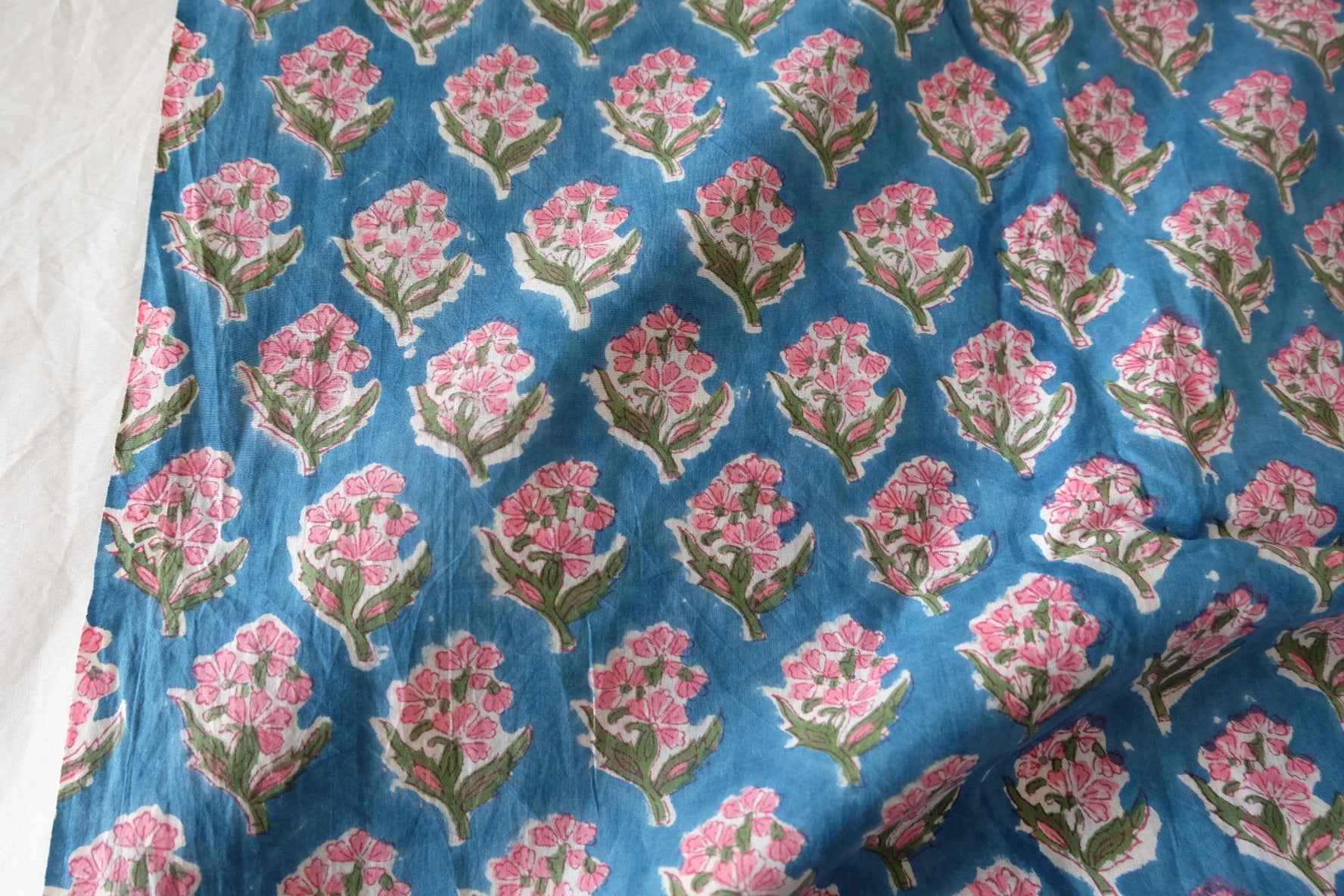 Indian Hand Block Printed Cotton Fabric – Pink Floral Motif on Blue – Sold by the Meter