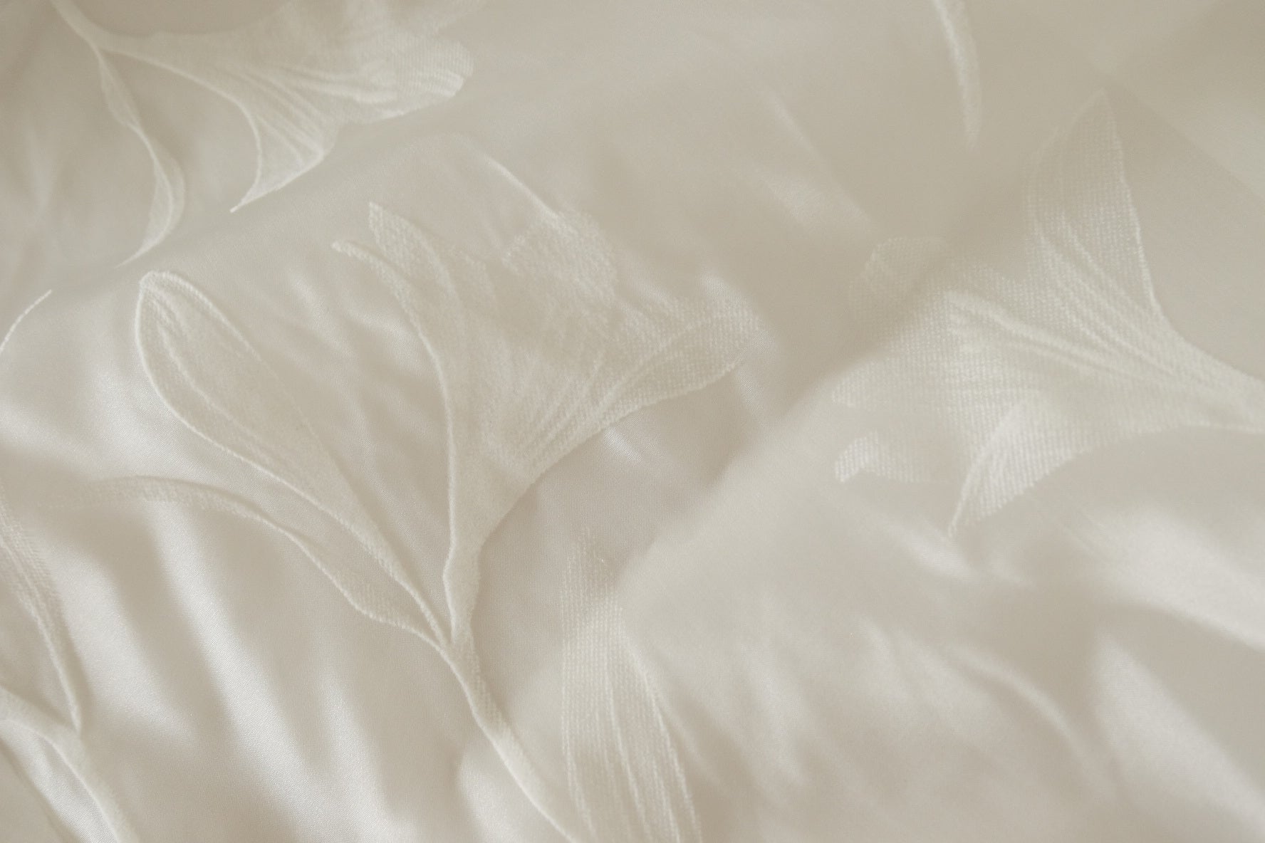 White Floral Flocked Polyester Mesh – 2.19 yd