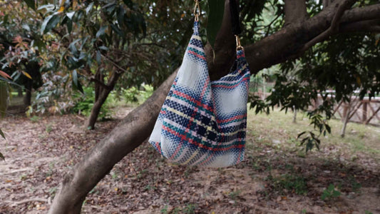 The Artisan Tote - Signature Edition Featuring heritage fabric with "stepped - flower" pattern and a soft faux lambswool strap - BUBBO