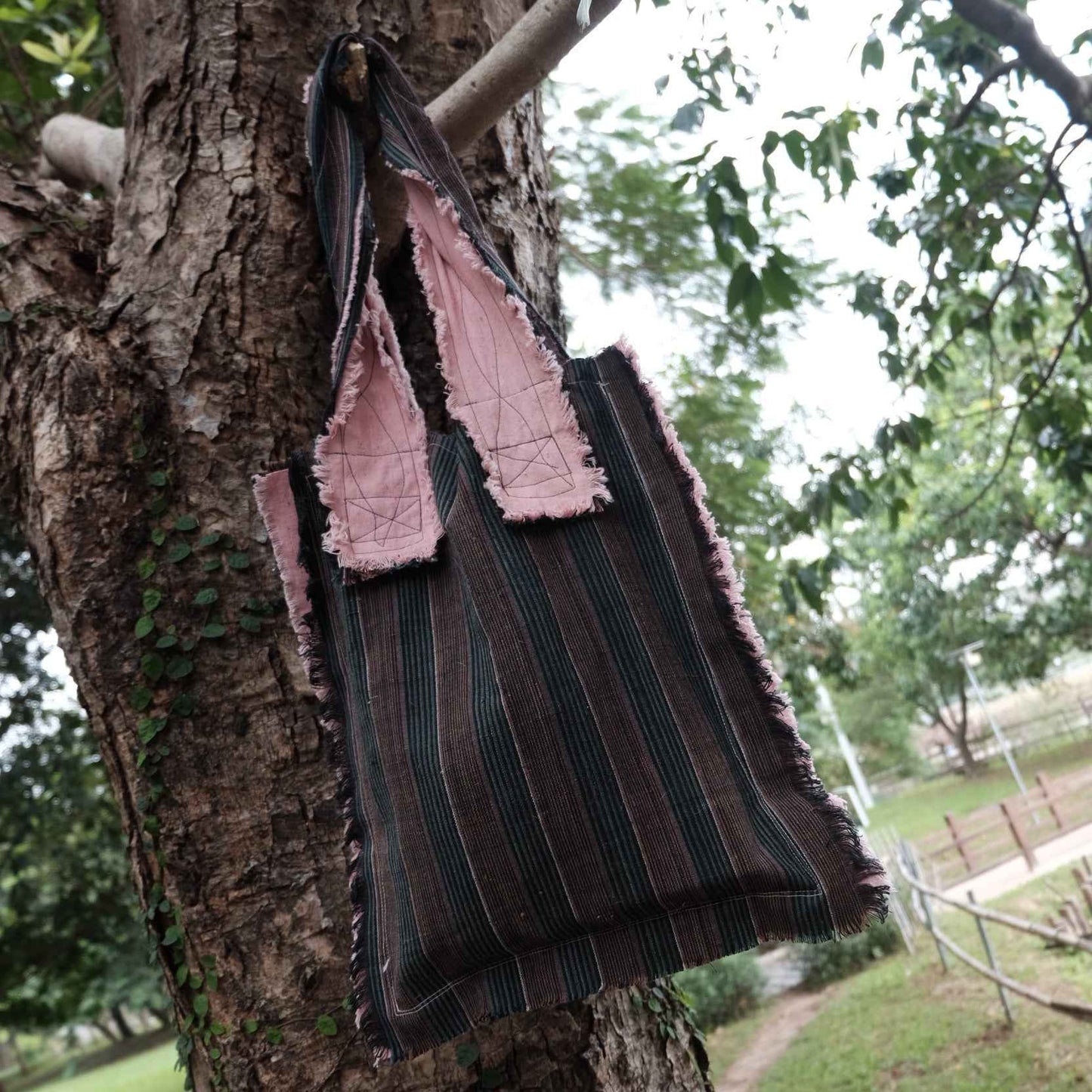The Earth & Blossom Tote - Artisan Edition A soft tote with hand - dyed pink accents and two inner pockets - BUBBO
