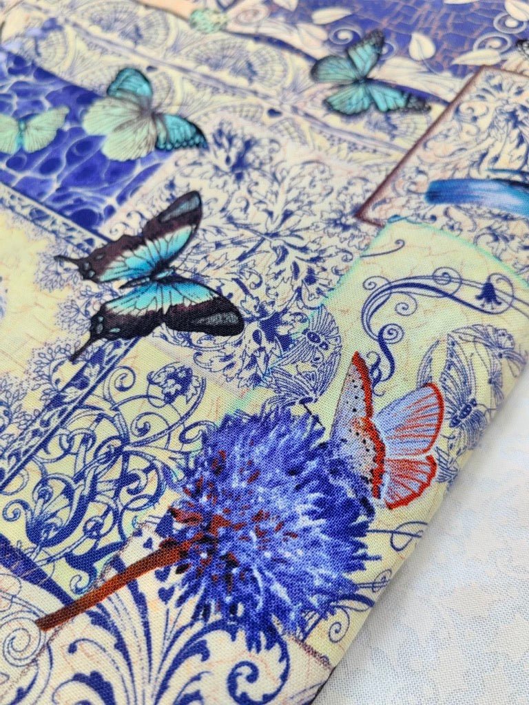 Vintage Collage Butterfly & Floral Cotton Fabric – Royal Blue & White – 45” Wide – Sold by the Half Yard - BUBBO